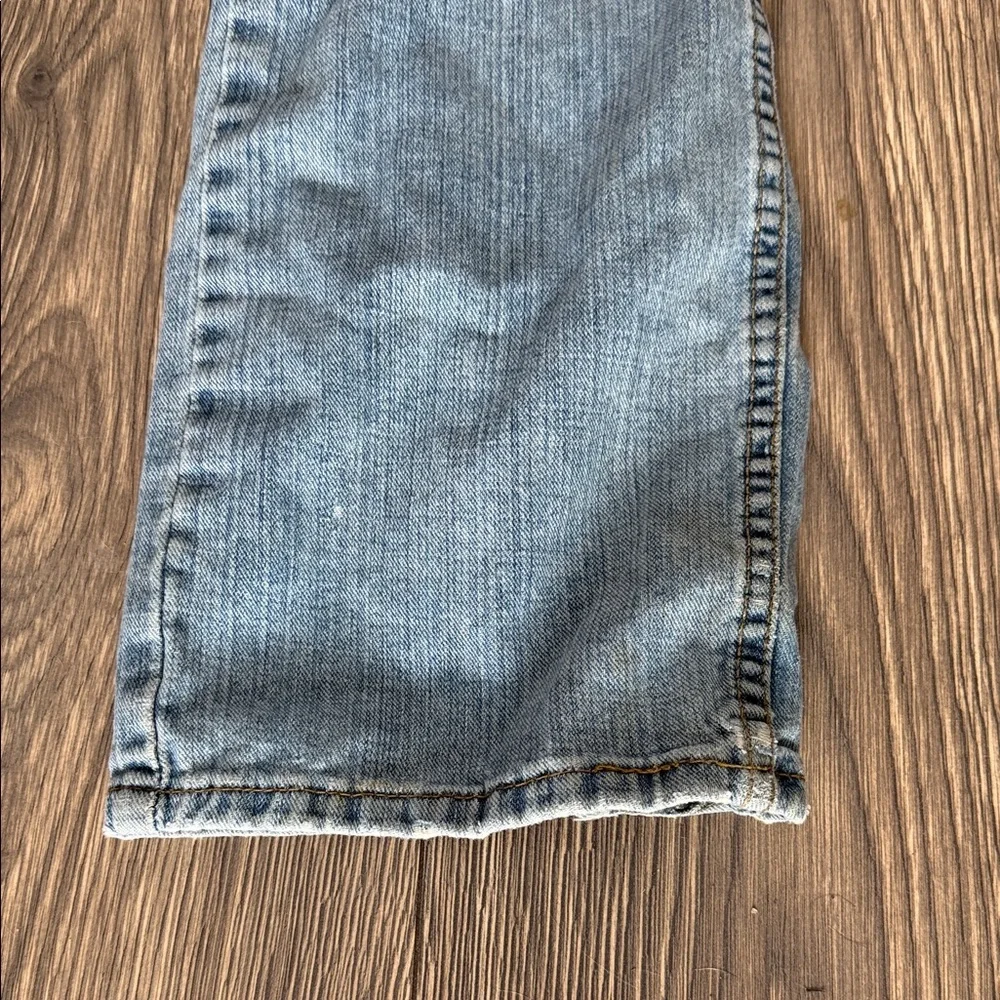 Levi's Light Blue Straight Jeans with Distressed Details